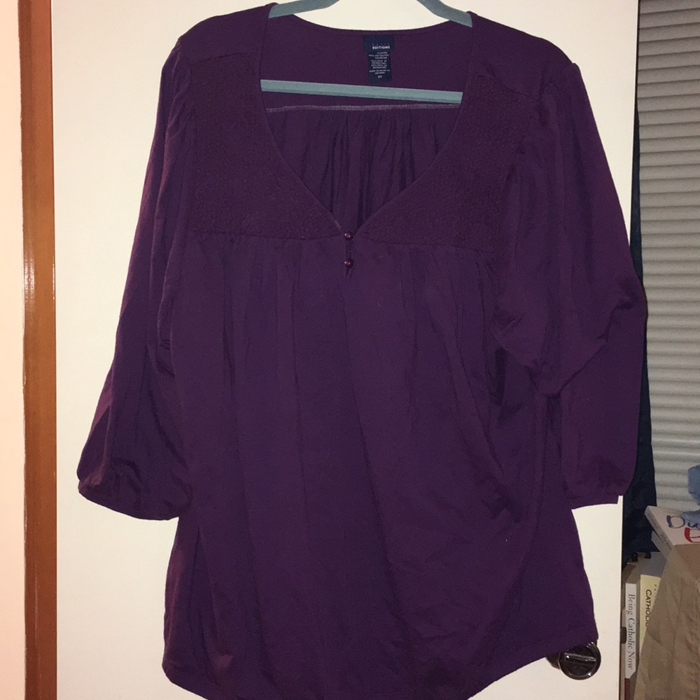 Purple top with V neck and smocking detail